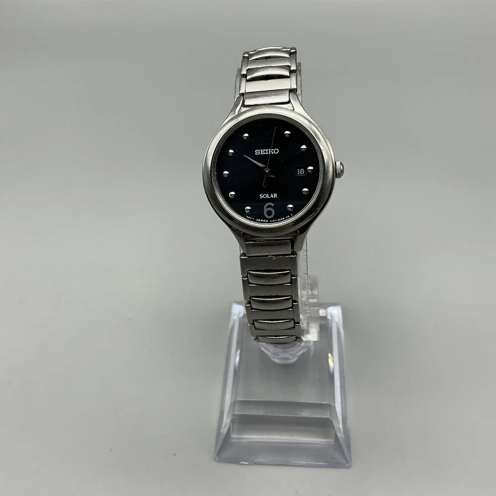 Seiko Solar Womens Watch 28mm Black Dial Silver Tone Stainless Stretch Bracelet